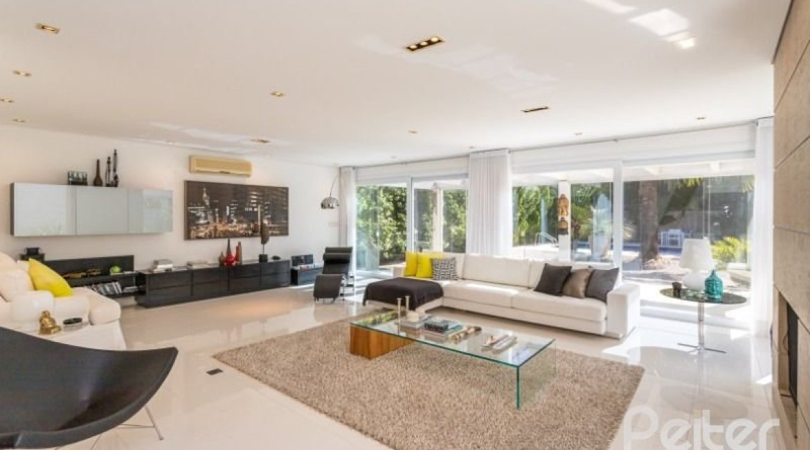 Casa em Condomínio à venda com 253m², 3 dormitórios, 1 suíte, 2 vagas, no bairro Terra Ville em PORTO ALEGRE