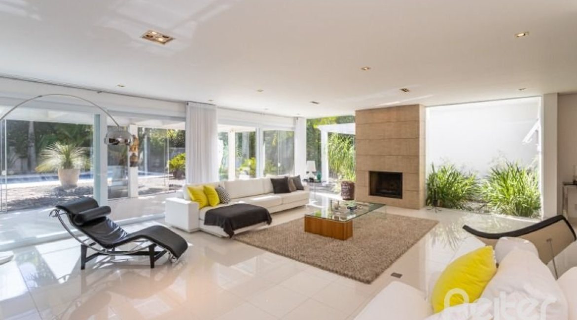 Casa em Condomínio à venda com 253m², 3 dormitórios, 1 suíte, 2 vagas, no bairro Terra Ville em PORTO ALEGRE