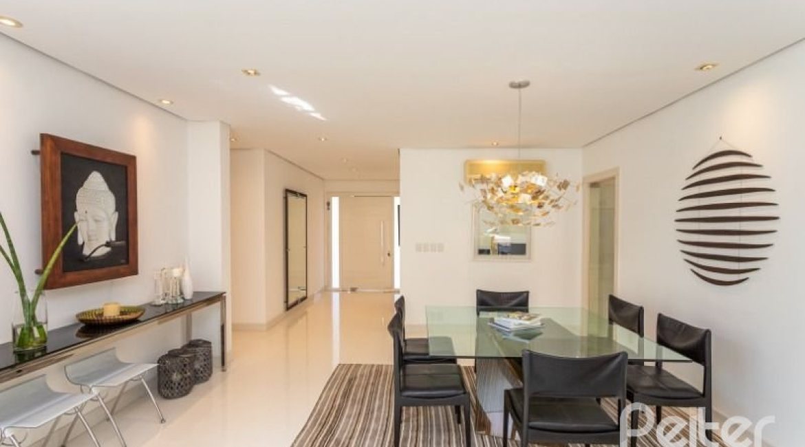 Casa em Condomínio à venda com 253m², 3 dormitórios, 1 suíte, 2 vagas, no bairro Terra Ville em PORTO ALEGRE