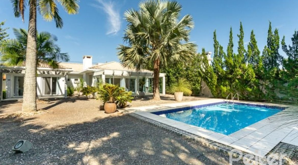 Casa em Condomínio à venda com 253m², 3 dormitórios, 1 suíte, 2 vagas, no bairro Terra Ville em PORTO ALEGRE