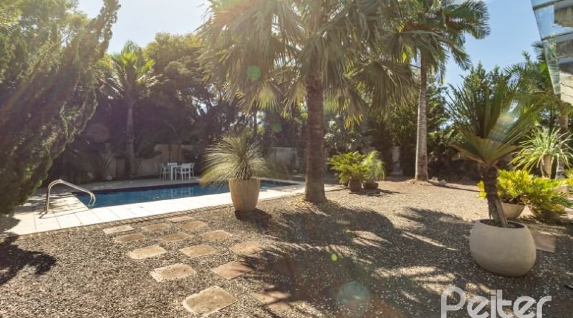 Casa em Condomínio à venda com 253m², 3 dormitórios, 1 suíte, 2 vagas, no bairro Terra Ville em PORTO ALEGRE