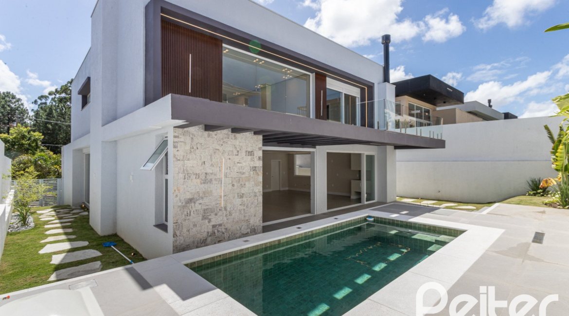 Casa em Condomínio à venda com 387m², 4 dormitórios, 4 suítes, 5 vagas, no bairro Alphaville em PORTO ALEGRE