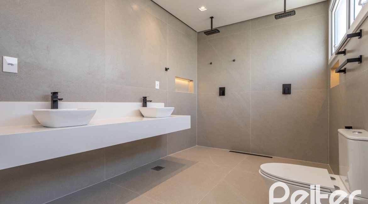 Casa em Condomínio à venda com 387m², 4 dormitórios, 4 suítes, 5 vagas, no bairro Alphaville em PORTO ALEGRE