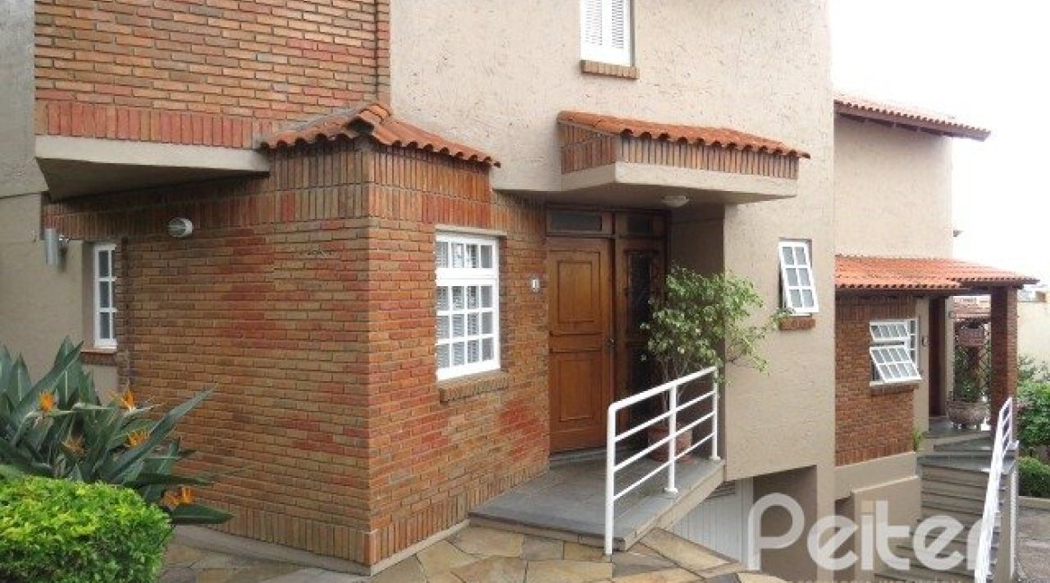 Casa em Condomínio à venda com 198m², 3 dormitórios, 1 suíte, 2 vagas, no bairro Tristeza em Porto Alegre