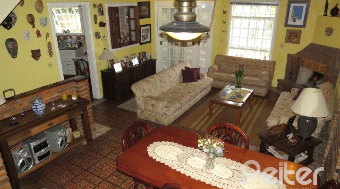 Casa em Condomínio à venda com 198m², 3 dormitórios, 1 suíte, 2 vagas, no bairro Tristeza em Porto Alegre