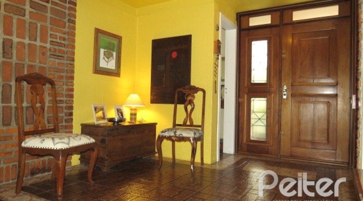 Casa em Condomínio à venda com 198m², 3 dormitórios, 1 suíte, 2 vagas, no bairro Tristeza em Porto Alegre