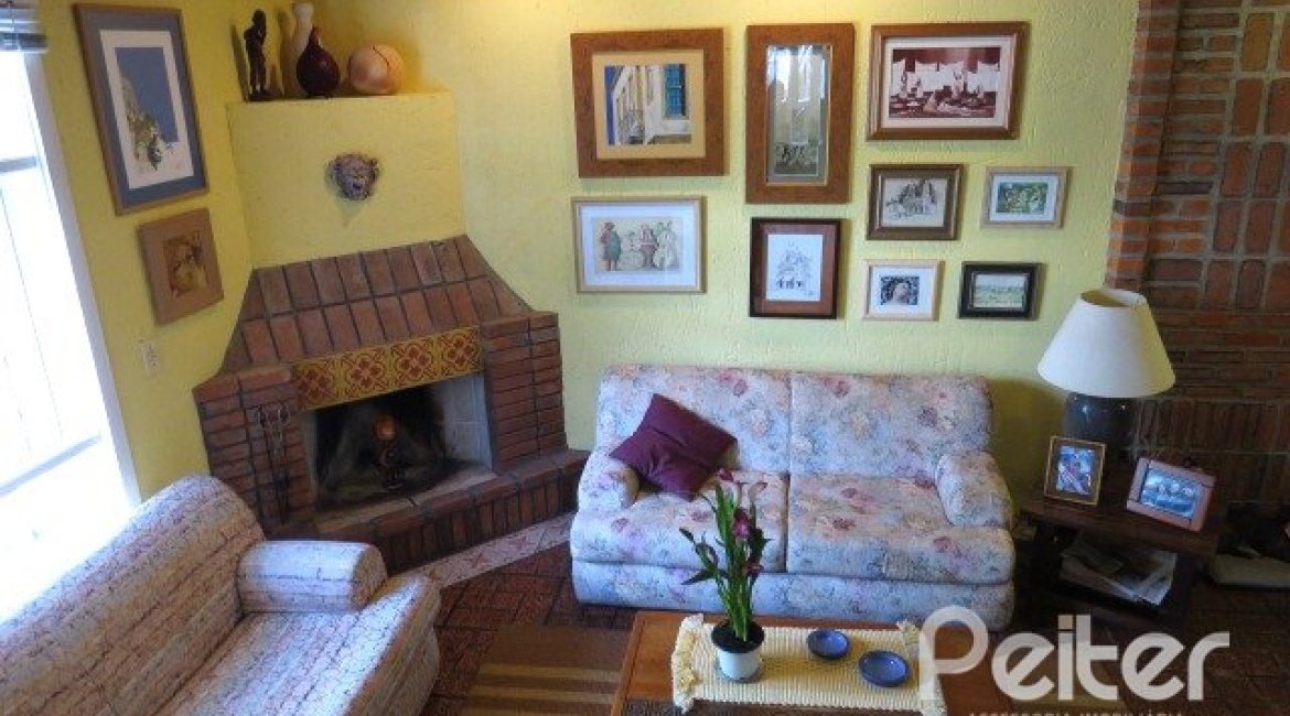 Casa em Condomínio à venda com 198m², 3 dormitórios, 1 suíte, 2 vagas, no bairro Tristeza em Porto Alegre