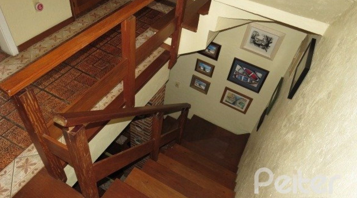 Casa em Condomínio à venda com 198m², 3 dormitórios, 1 suíte, 2 vagas, no bairro Tristeza em Porto Alegre