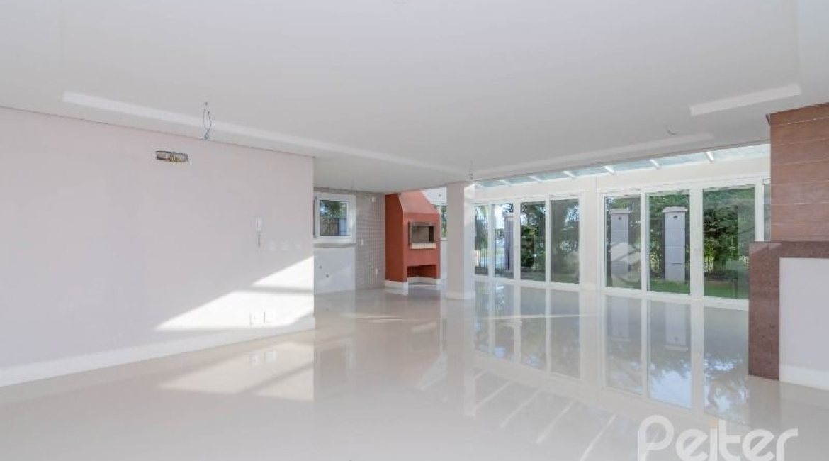 Casa em Condomínio à venda com 343m², 3 dormitórios, 3 suítes, 3 vagas, no bairro Tristeza em Porto Alegre