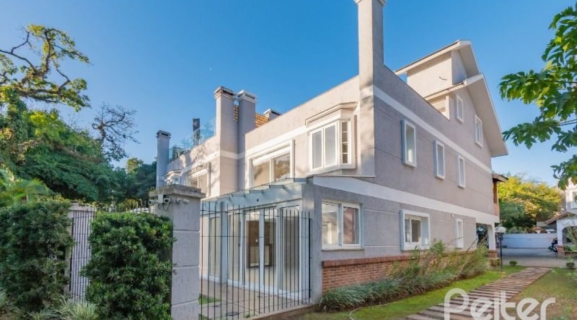 Casa em Condomínio à venda com 343m², 3 dormitórios, 3 suítes, 3 vagas, no bairro Tristeza em Porto Alegre