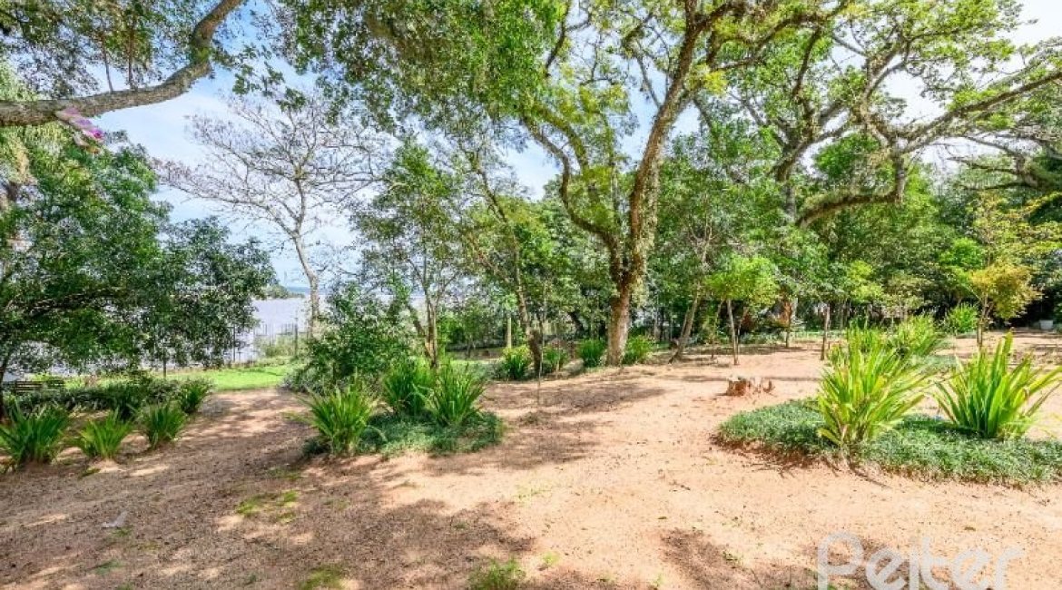 Casa em Condomínio à venda com 343m², 3 dormitórios, 3 suítes, 3 vagas, no bairro Tristeza em Porto Alegre