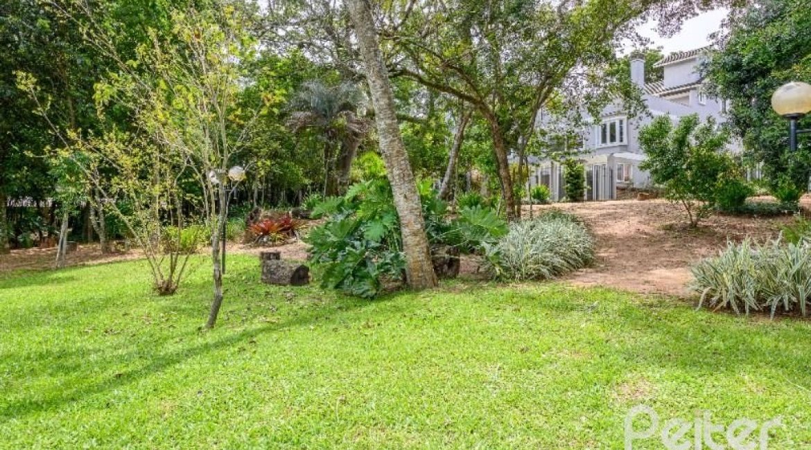 Casa em Condomínio à venda com 343m², 3 dormitórios, 3 suítes, 3 vagas, no bairro Tristeza em Porto Alegre