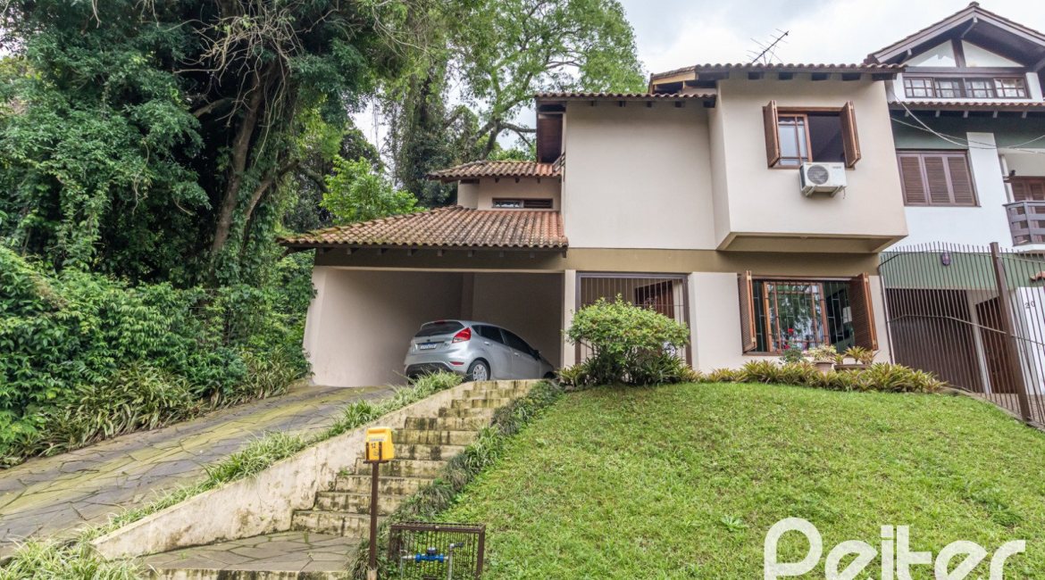 Casa à venda com 124m², 3 dormitórios, 1 suíte, 2 vagas, no bairro Jardim Isabel em Porto Alegre