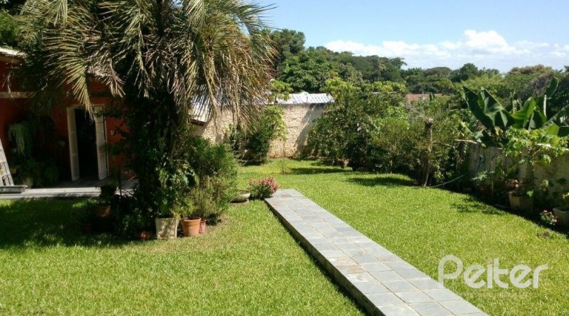 Casa à venda com 374m², 4 dormitórios, 3 suítes, 3 vagas, no bairro Vila Assunção em Porto Alegre