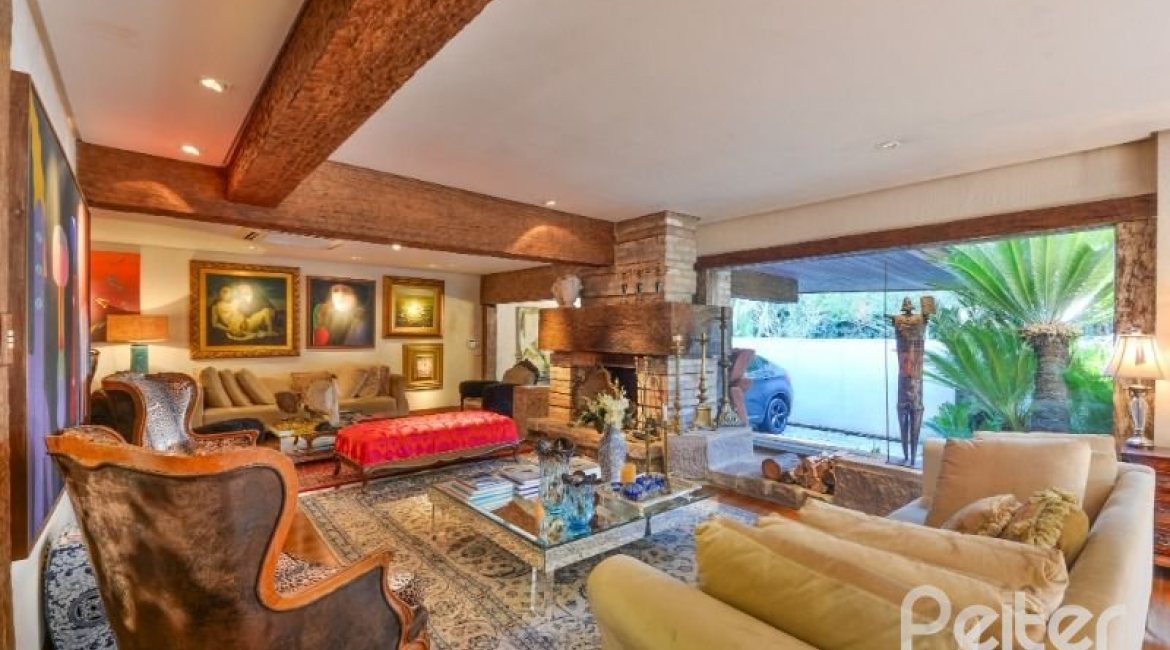 Casa à venda com 418m², 3 dormitórios, 1 suíte, 2 vagas, no bairro Jardim Isabel em Porto Alegre