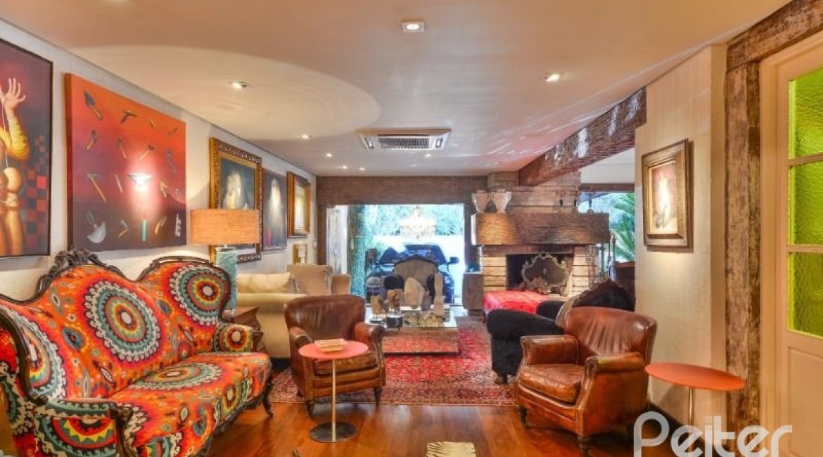 Casa à venda com 418m², 3 dormitórios, 1 suíte, 2 vagas, no bairro Jardim Isabel em Porto Alegre