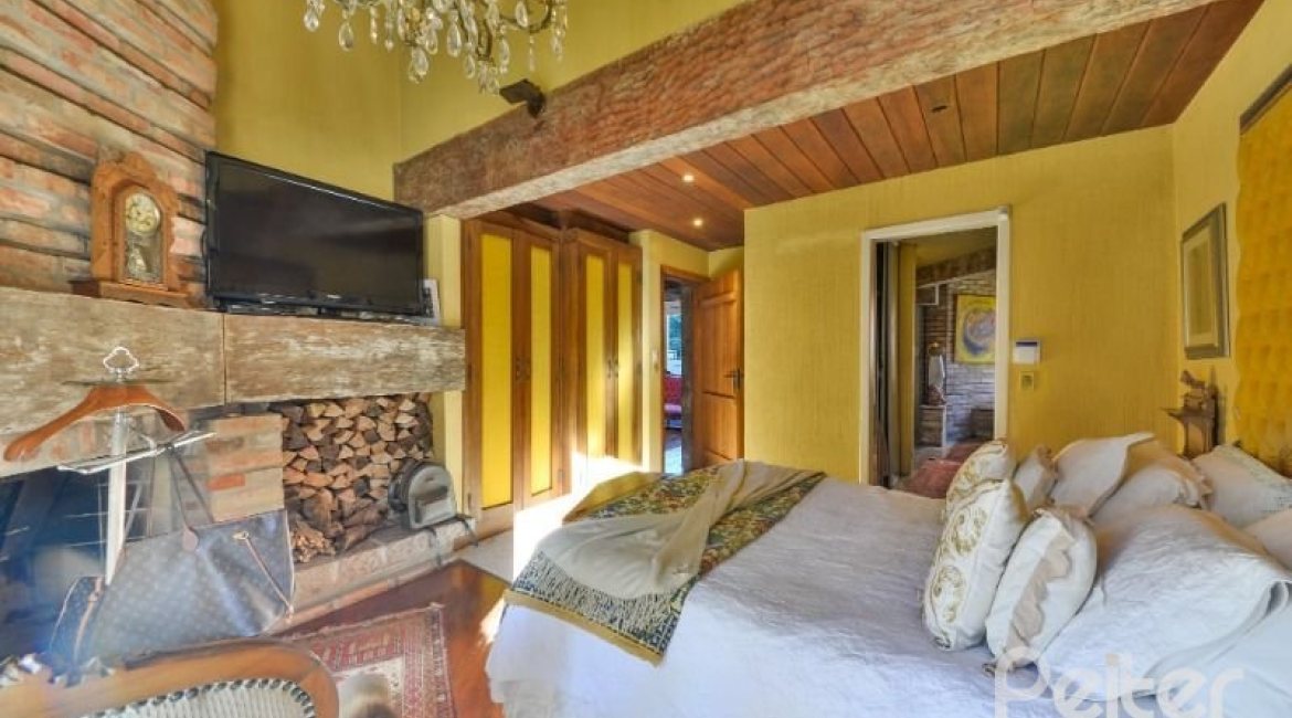 Casa à venda com 418m², 3 dormitórios, 1 suíte, 2 vagas, no bairro Jardim Isabel em Porto Alegre