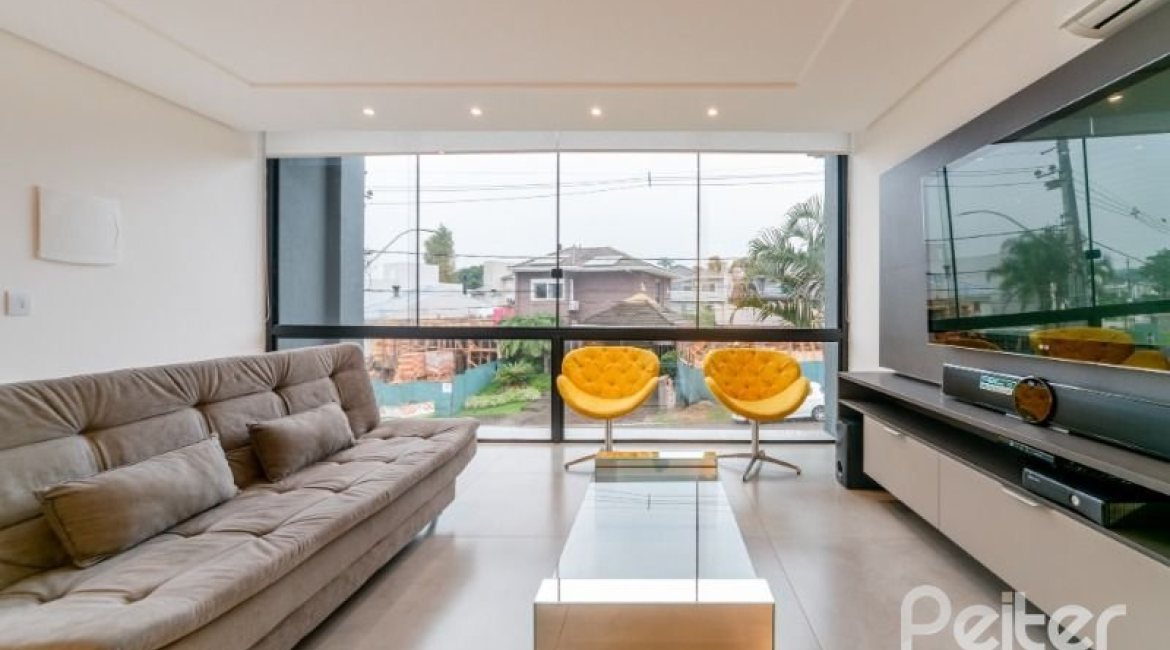 Casa em Condomínio à venda com 250m², 3 dormitórios, 3 suítes, 3 vagas, no bairro Hipica em PORTO ALEGRE