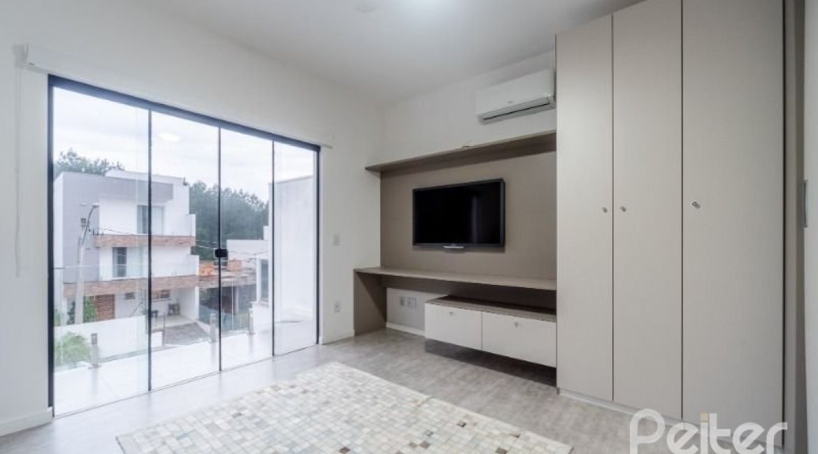 Casa em Condomínio à venda com 250m², 3 dormitórios, 3 suítes, 3 vagas, no bairro Hipica em PORTO ALEGRE