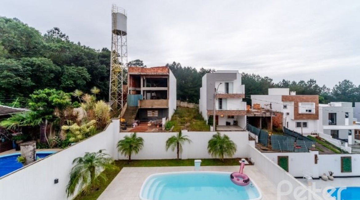 Casa em Condomínio à venda com 250m², 3 dormitórios, 3 suítes, 3 vagas, no bairro Hipica em PORTO ALEGRE