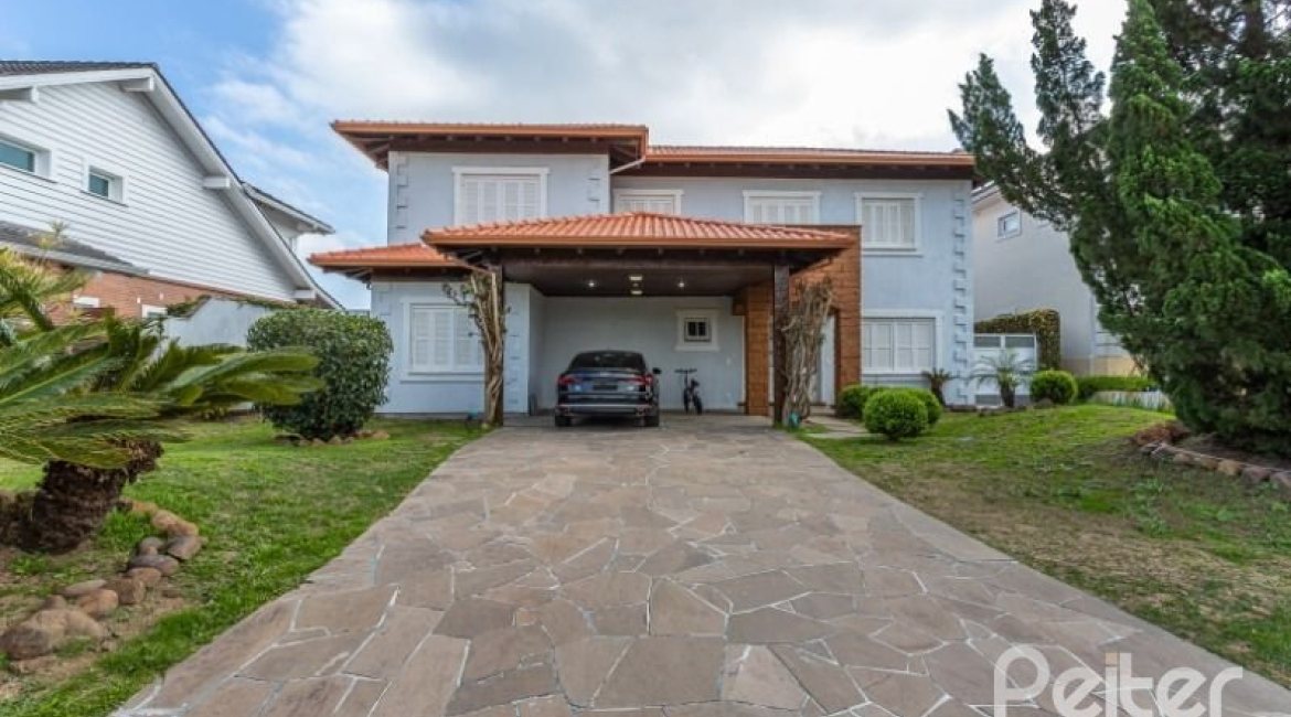 Casa em Condomínio à venda com 348m², 4 dormitórios, 2 suítes, 4 vagas, no bairro Terra Ville em PORTO ALEGRE