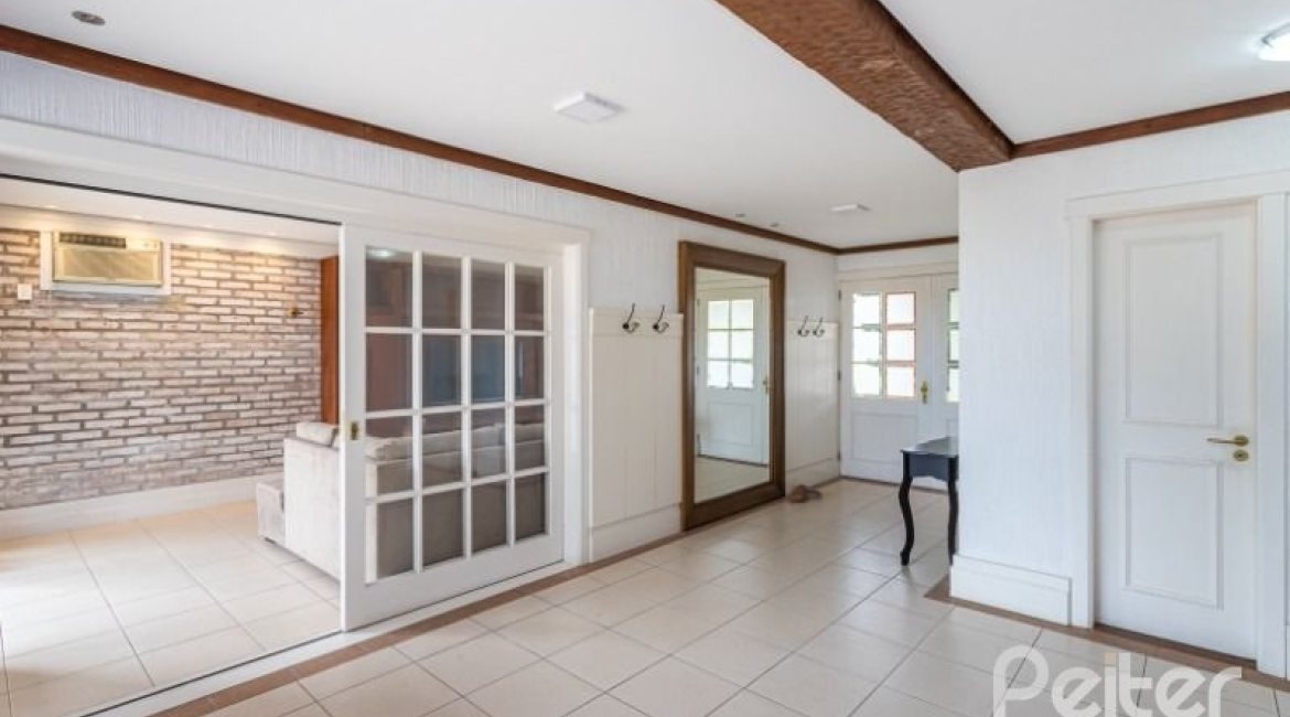 Casa em Condomínio à venda com 348m², 4 dormitórios, 2 suítes, 4 vagas, no bairro Terra Ville em PORTO ALEGRE