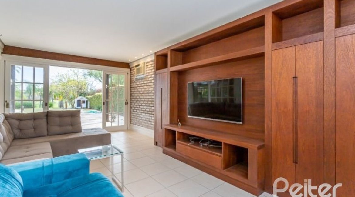 Casa em Condomínio à venda com 348m², 4 dormitórios, 2 suítes, 4 vagas, no bairro Terra Ville em PORTO ALEGRE