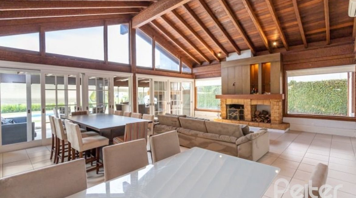 Casa em Condomínio à venda com 348m², 4 dormitórios, 2 suítes, 4 vagas, no bairro Terra Ville em PORTO ALEGRE