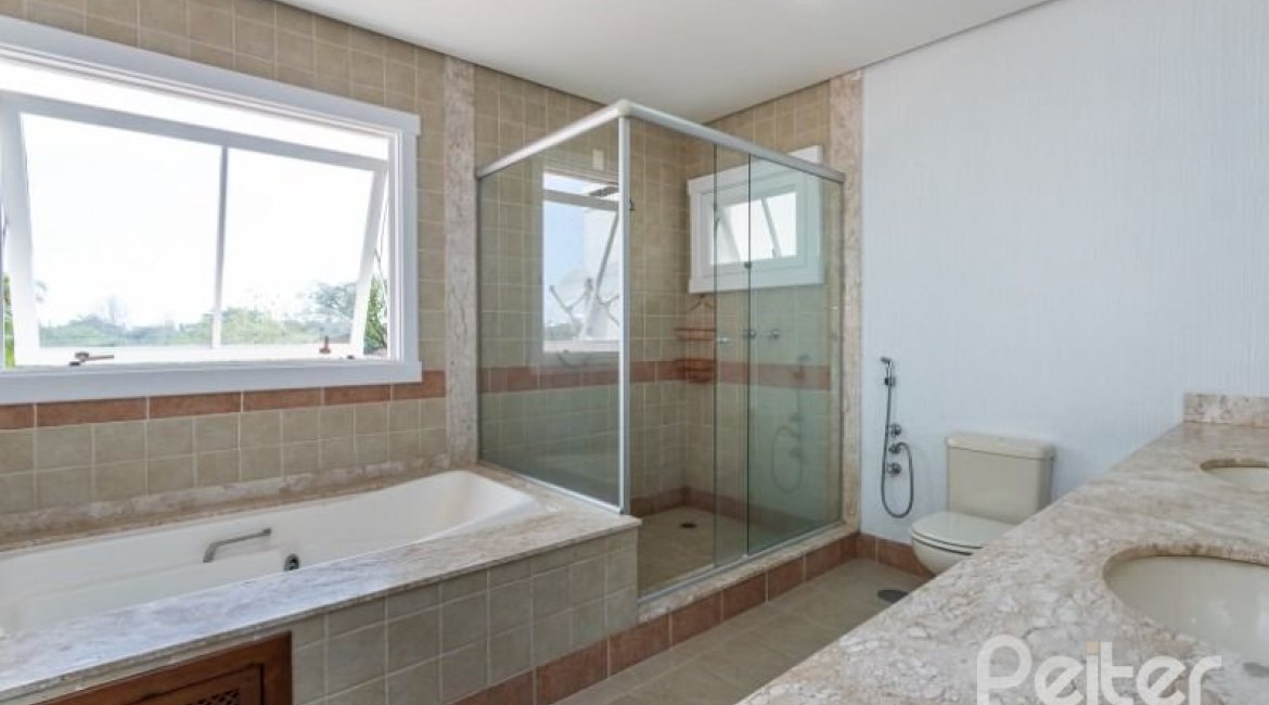 Casa em Condomínio à venda com 348m², 4 dormitórios, 2 suítes, 4 vagas, no bairro Terra Ville em PORTO ALEGRE