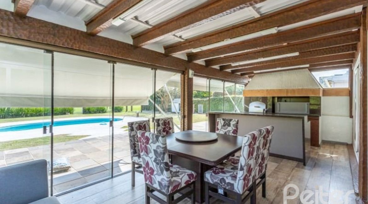 Casa em Condomínio à venda com 348m², 4 dormitórios, 2 suítes, 4 vagas, no bairro Terra Ville em PORTO ALEGRE