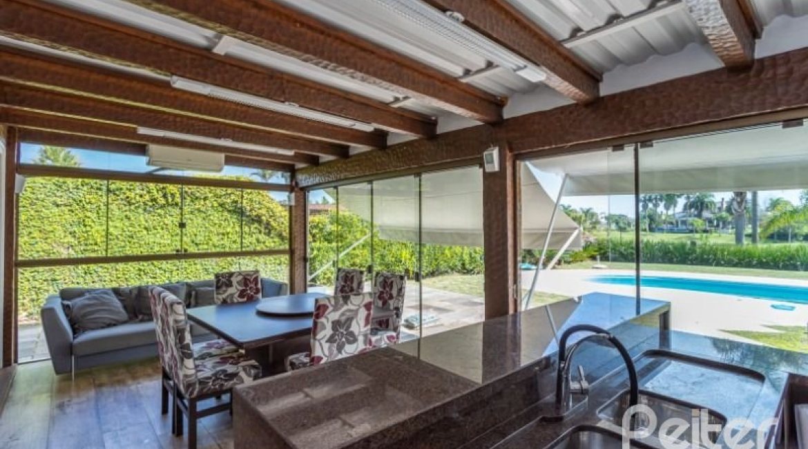 Casa em Condomínio à venda com 348m², 4 dormitórios, 2 suítes, 4 vagas, no bairro Terra Ville em PORTO ALEGRE