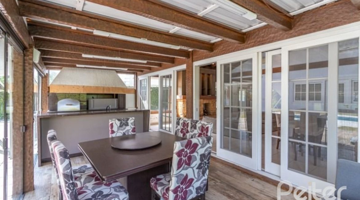 Casa em Condomínio à venda com 348m², 4 dormitórios, 2 suítes, 4 vagas, no bairro Terra Ville em PORTO ALEGRE