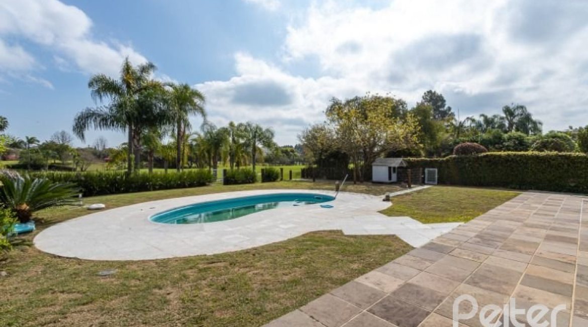 Casa em Condomínio à venda com 348m², 4 dormitórios, 2 suítes, 4 vagas, no bairro Terra Ville em PORTO ALEGRE