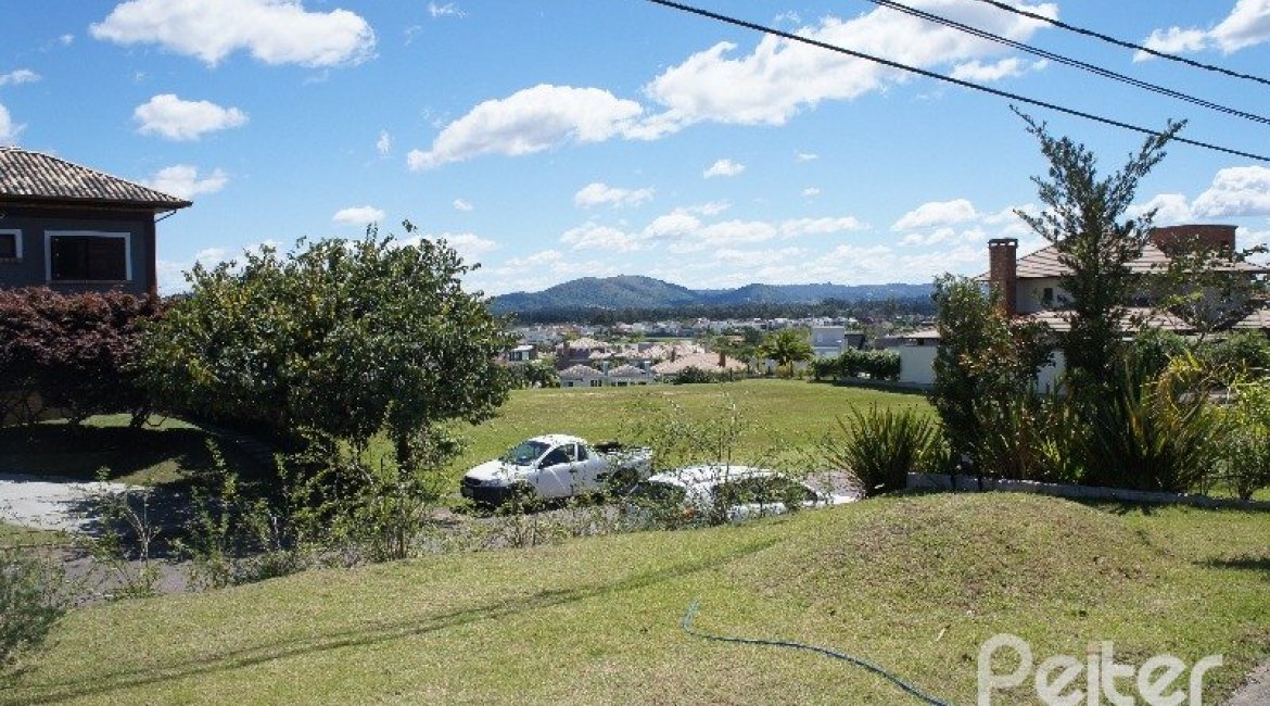 Casa em Condomínio à venda com 288m², 3 dormitórios, 3 suítes, 4 vagas, no bairro Terra Ville em PORTO ALEGRE