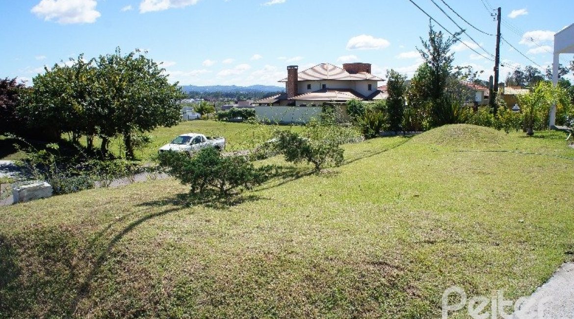 Casa em Condomínio à venda com 288m², 3 dormitórios, 3 suítes, 4 vagas, no bairro Terra Ville em PORTO ALEGRE