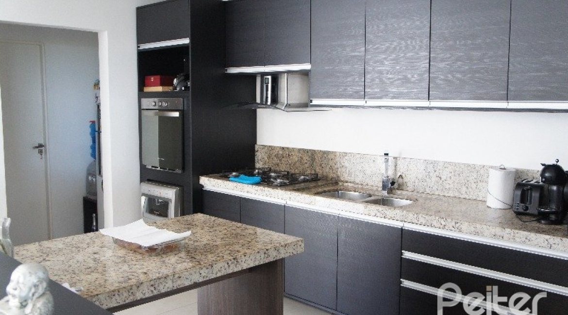 Casa em Condomínio à venda com 288m², 3 dormitórios, 3 suítes, 4 vagas, no bairro Terra Ville em PORTO ALEGRE