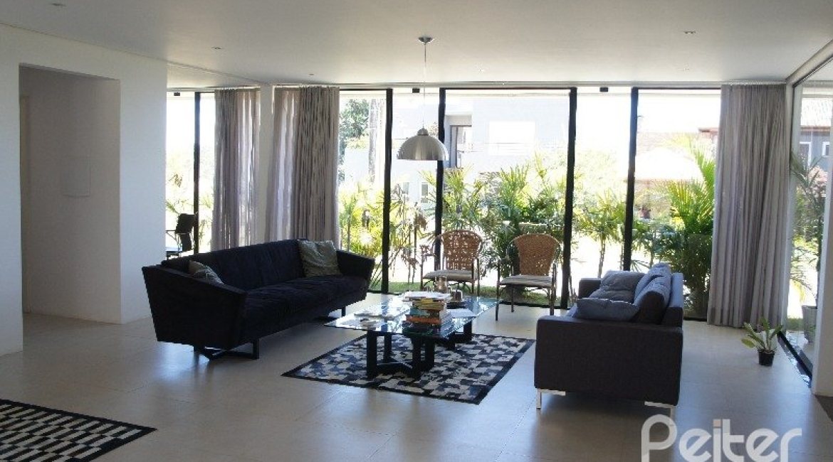 Casa em Condomínio à venda com 288m², 3 dormitórios, 3 suítes, 4 vagas, no bairro Terra Ville em PORTO ALEGRE