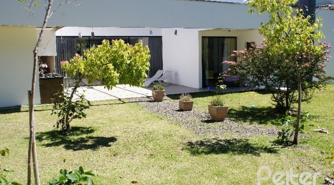 Casa em Condomínio à venda com 288m², 3 dormitórios, 3 suítes, 4 vagas, no bairro Terra Ville em PORTO ALEGRE