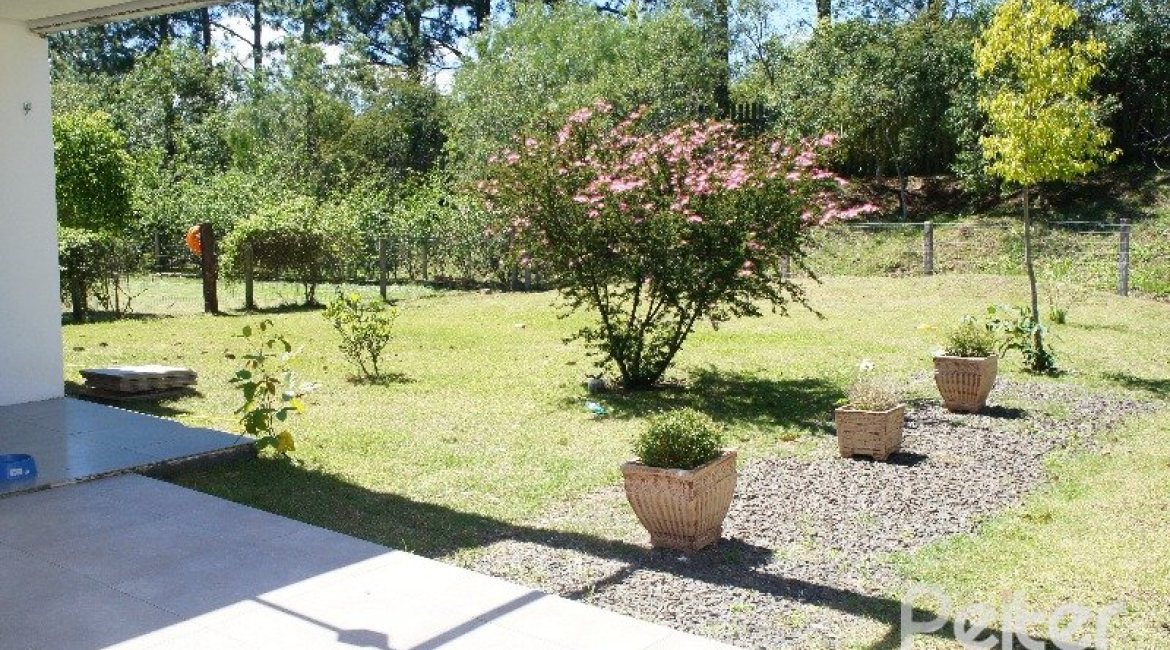 Casa em Condomínio à venda com 288m², 3 dormitórios, 3 suítes, 4 vagas, no bairro Terra Ville em PORTO ALEGRE