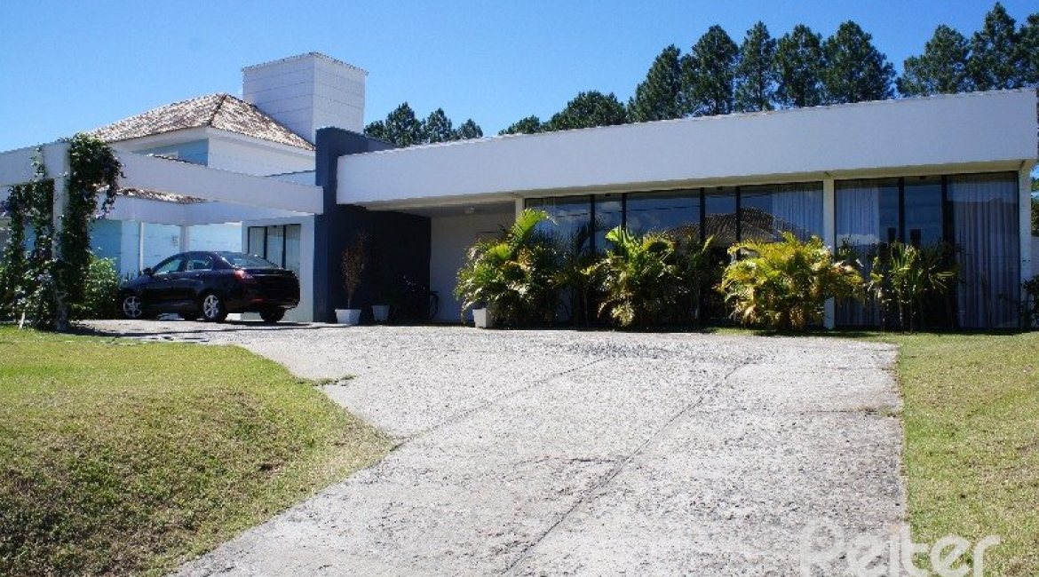 Casa em Condomínio à venda com 288m², 3 dormitórios, 3 suítes, 4 vagas, no bairro Terra Ville em PORTO ALEGRE