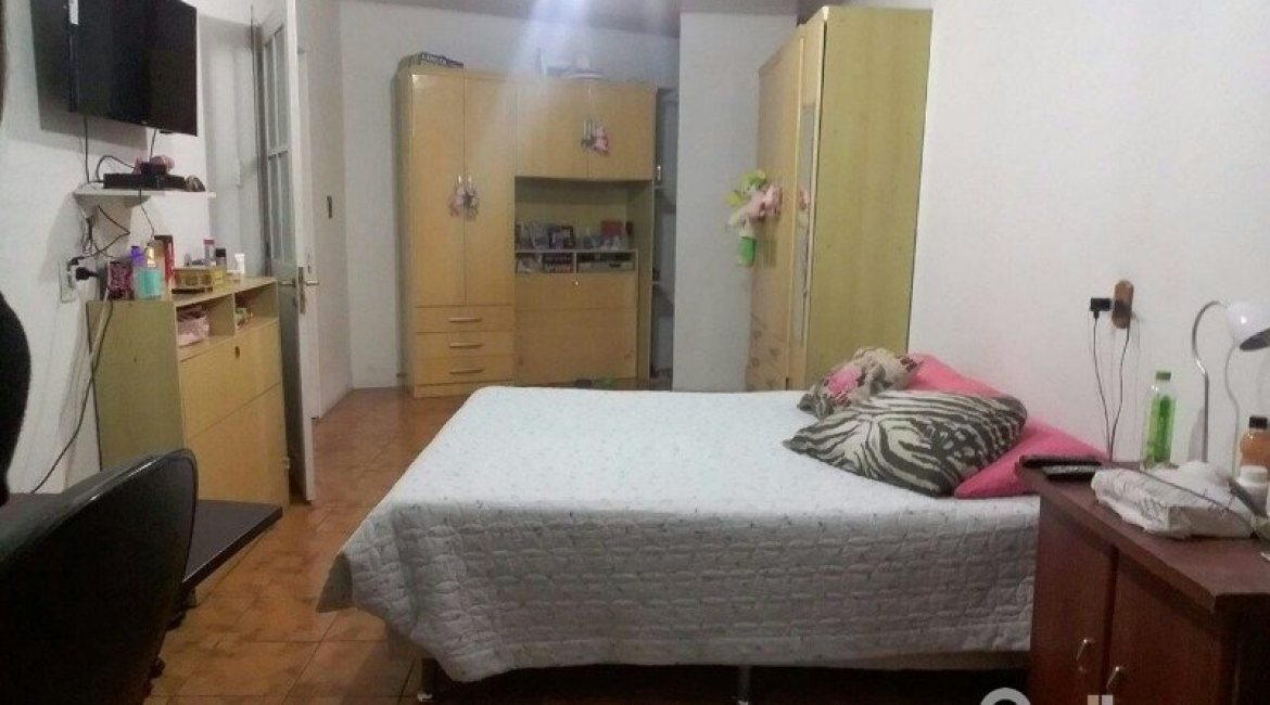 Casa à venda com 156m², 3 dormitórios, 1 suíte, 3 vagas, no bairro Vila Nova em Porto Alegre
