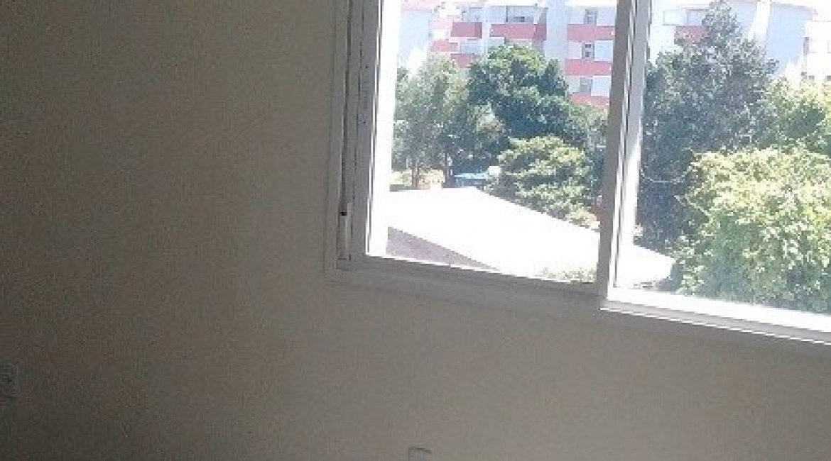 Apartamento à venda com 66m², 2 dormitórios, 1 suíte, 2 vagas, no bairro Cavalhada em Porto Alegre