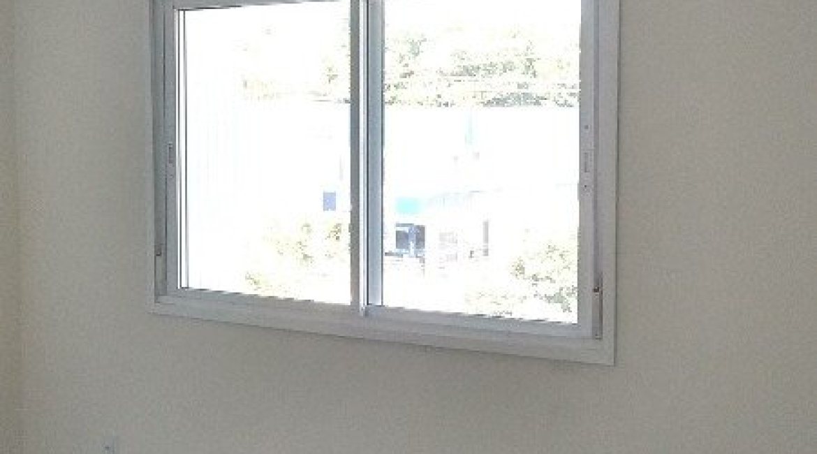 Apartamento à venda com 66m², 2 dormitórios, 1 suíte, 2 vagas, no bairro Cavalhada em Porto Alegre