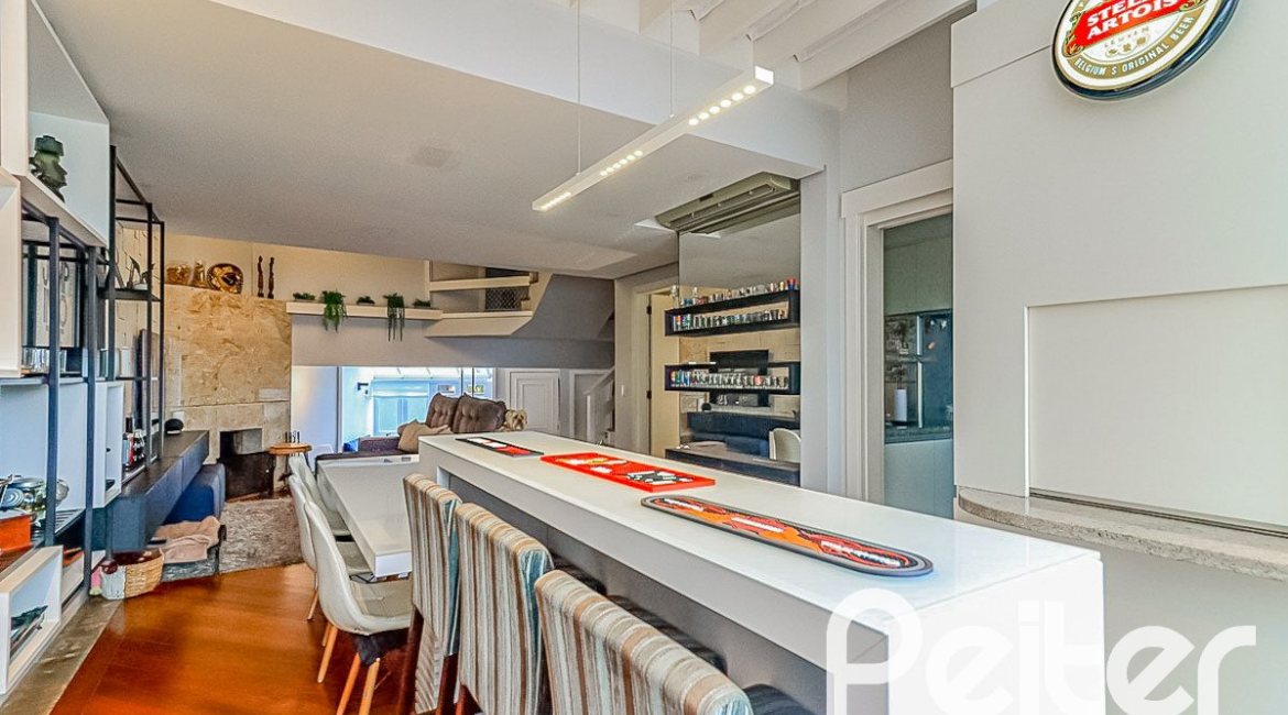 Casa em Condomínio à venda com 286m², 3 dormitórios, 1 suíte, 3 vagas, no bairro Jardim Isabel em Porto Alegre
