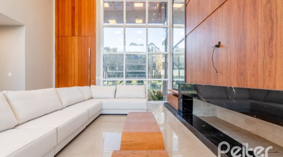 Casa em Condomínio à venda com 289m², 4 dormitórios, 4 suítes, 2 vagas, no bairro Alphaville em PORTO ALEGRE