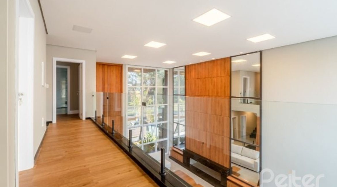 Casa em Condomínio à venda com 289m², 4 dormitórios, 4 suítes, 2 vagas, no bairro Alphaville em PORTO ALEGRE