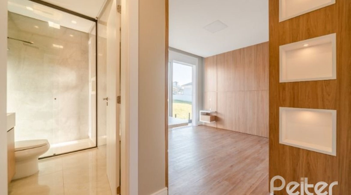 Casa em Condomínio à venda com 289m², 4 dormitórios, 4 suítes, 2 vagas, no bairro Alphaville em PORTO ALEGRE