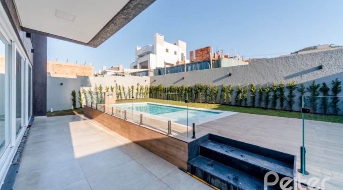 Casa em Condomínio à venda com 289m², 4 dormitórios, 4 suítes, 2 vagas, no bairro Alphaville em PORTO ALEGRE