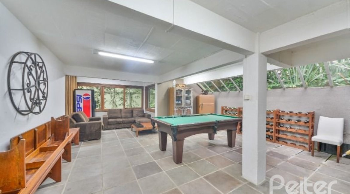 Casa em Condomínio à venda com 318m², 4 dormitórios, 1 suíte, 3 vagas, no bairro Ipanema em Porto Alegre