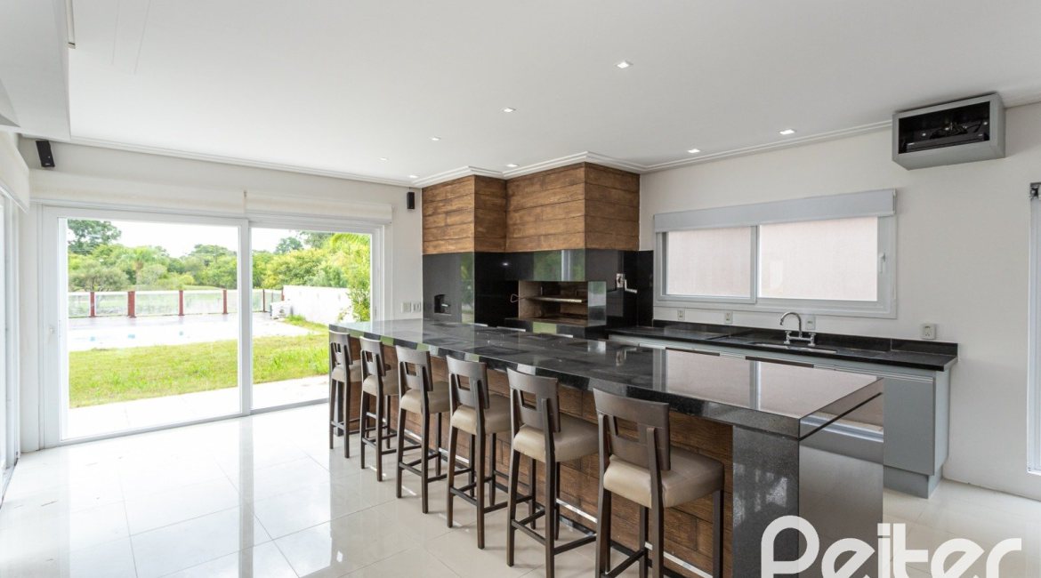 Casa em Condomínio à venda com 463m², 4 dormitórios, 4 suítes, 3 vagas, no bairro Terra Ville em PORTO ALEGRE